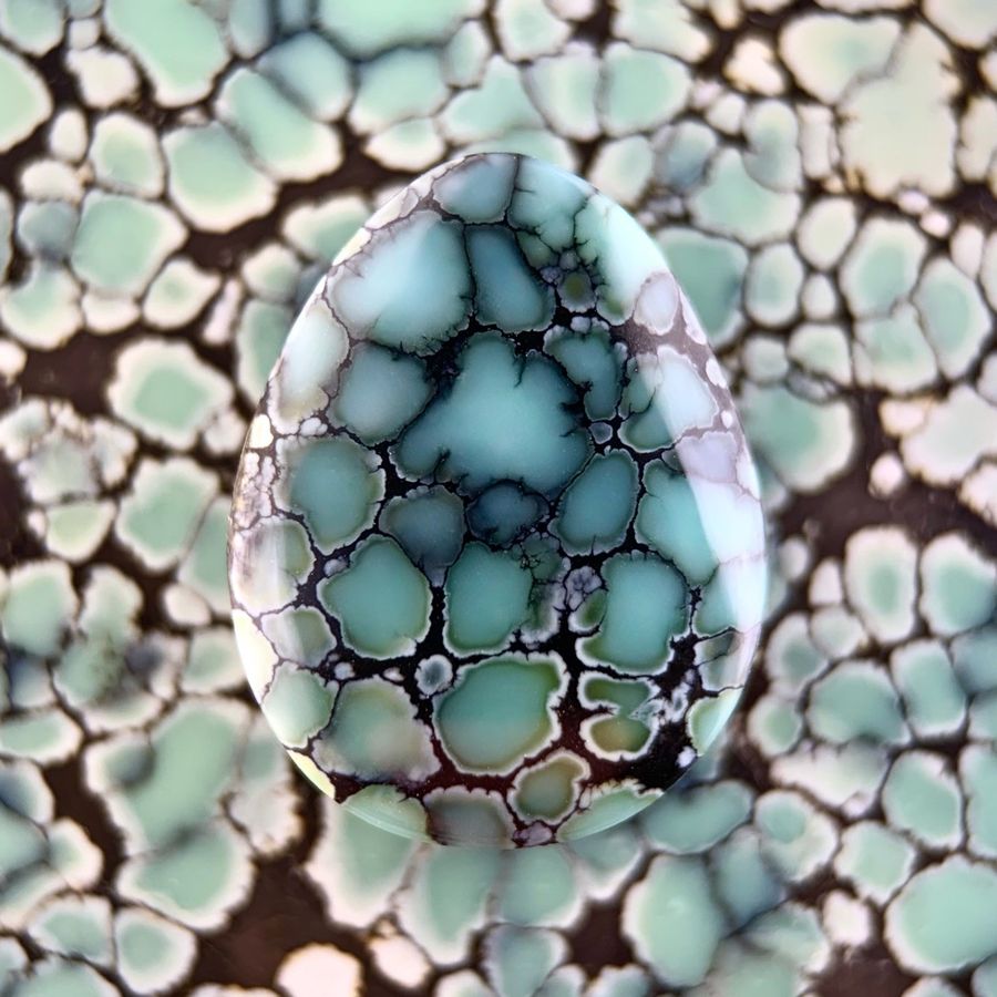 Polished variscite cabochon from the Colina Verde mine, Nevada